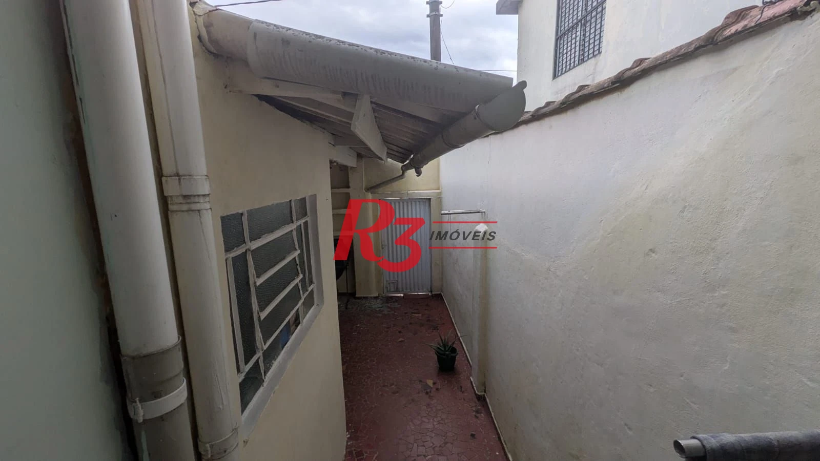Casa com 2 dormitórios à venda, 75 m² por R$ 450.000,00 - Vila Matias - Santos/SP