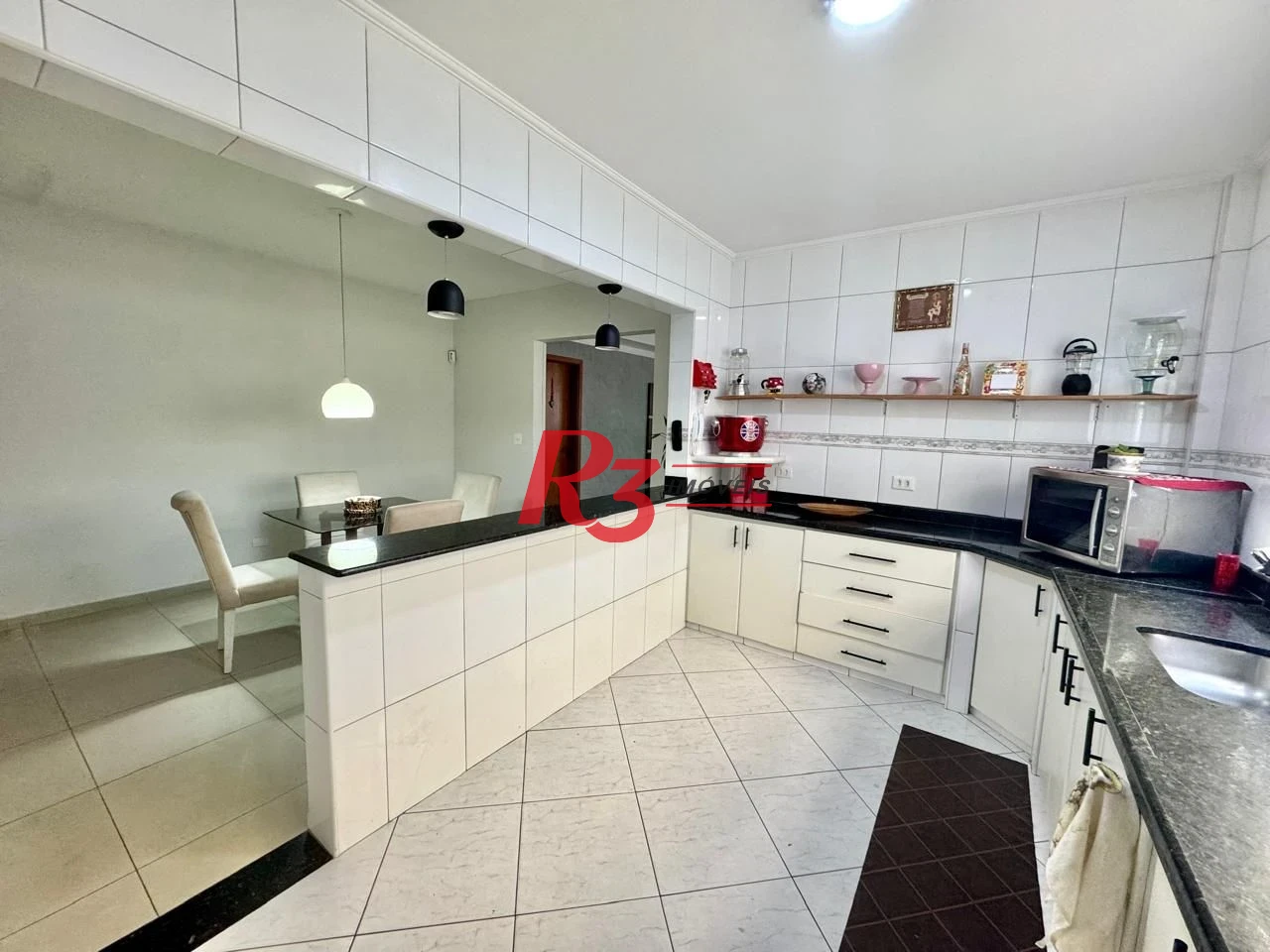 Sobrado com 4 dormitórios à venda, 203 m² por R$ 1.500.000,00 - Estuário - Santos/SP