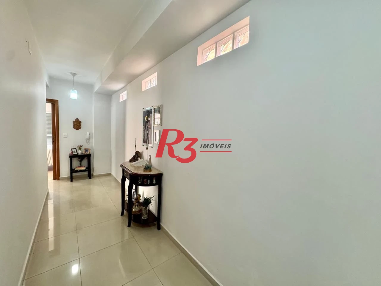 Sobrado com 4 dormitórios à venda, 203 m² por R$ 1.500.000,00 - Estuário - Santos/SP