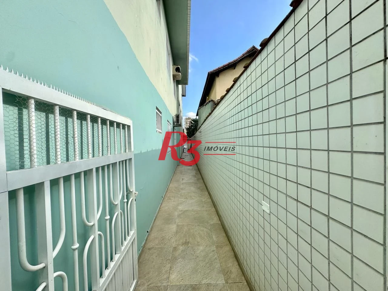 Sobrado com 4 dormitórios à venda, 203 m² por R$ 1.500.000,00 - Estuário - Santos/SP