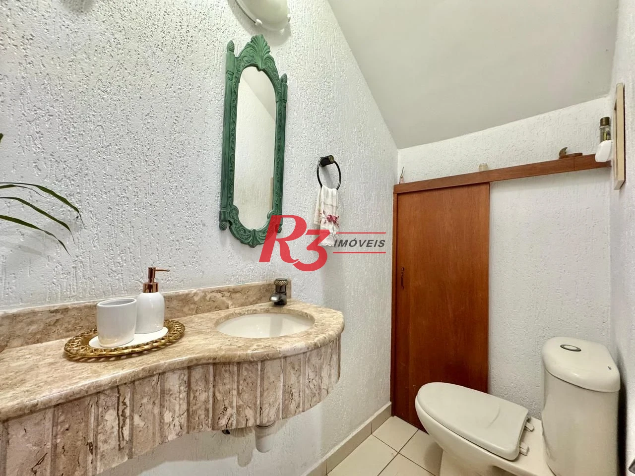 Sobrado com 4 dormitórios à venda, 203 m² por R$ 1.500.000,00 - Estuário - Santos/SP
