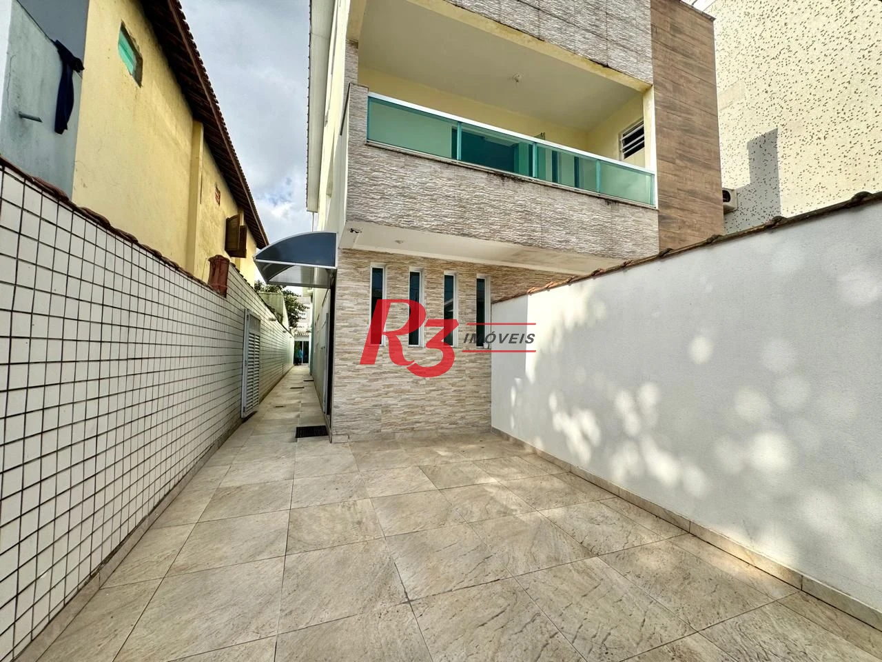 Sobrado com 4 dormitórios à venda, 203 m² por R$ 1.500.000,00 - Estuário - Santos/SP