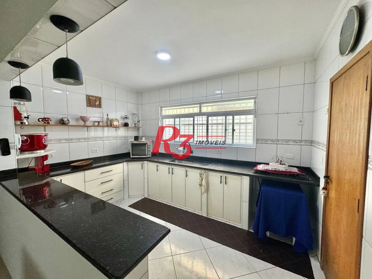 Sobrado com 4 dormitórios à venda, 203 m² por R$ 1.500.000,00 - Estuário - Santos/SP