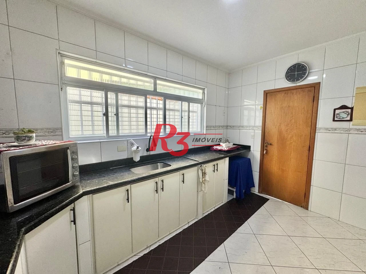 Sobrado com 4 dormitórios à venda, 203 m² por R$ 1.500.000,00 - Estuário - Santos/SP