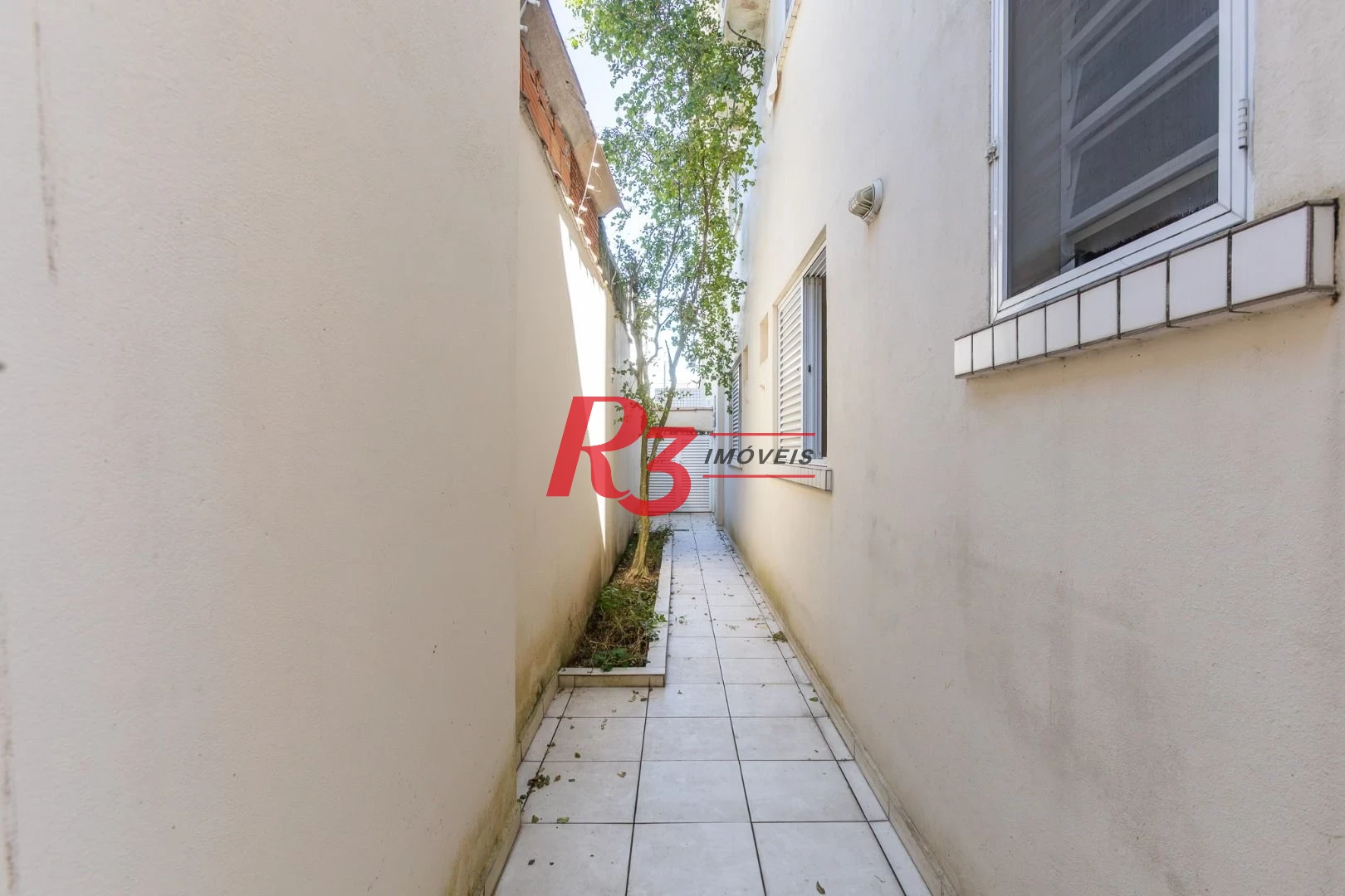 Casa com 3 dormitórios à venda, 162 m² por R$ 1.166.000,00 - Ponta da Praia - Santos/SP