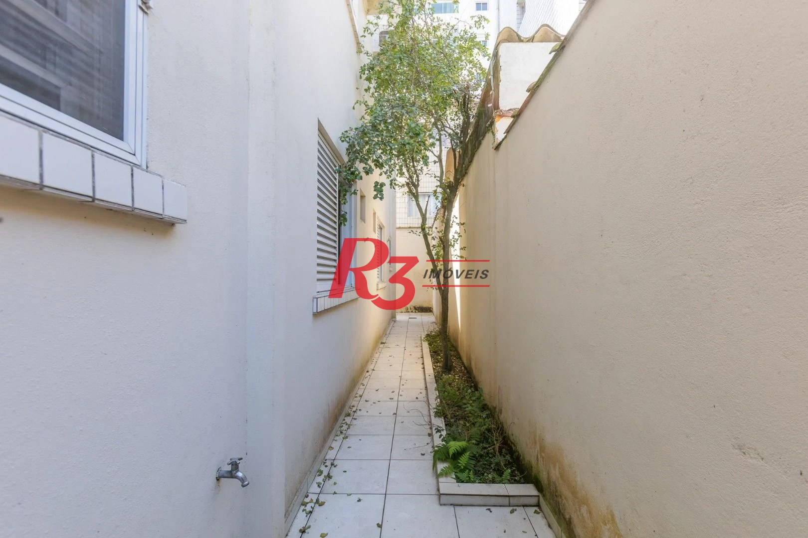 Casa com 3 dormitórios à venda, 162 m² por R$ 1.166.000,00 - Ponta da Praia - Santos/SP