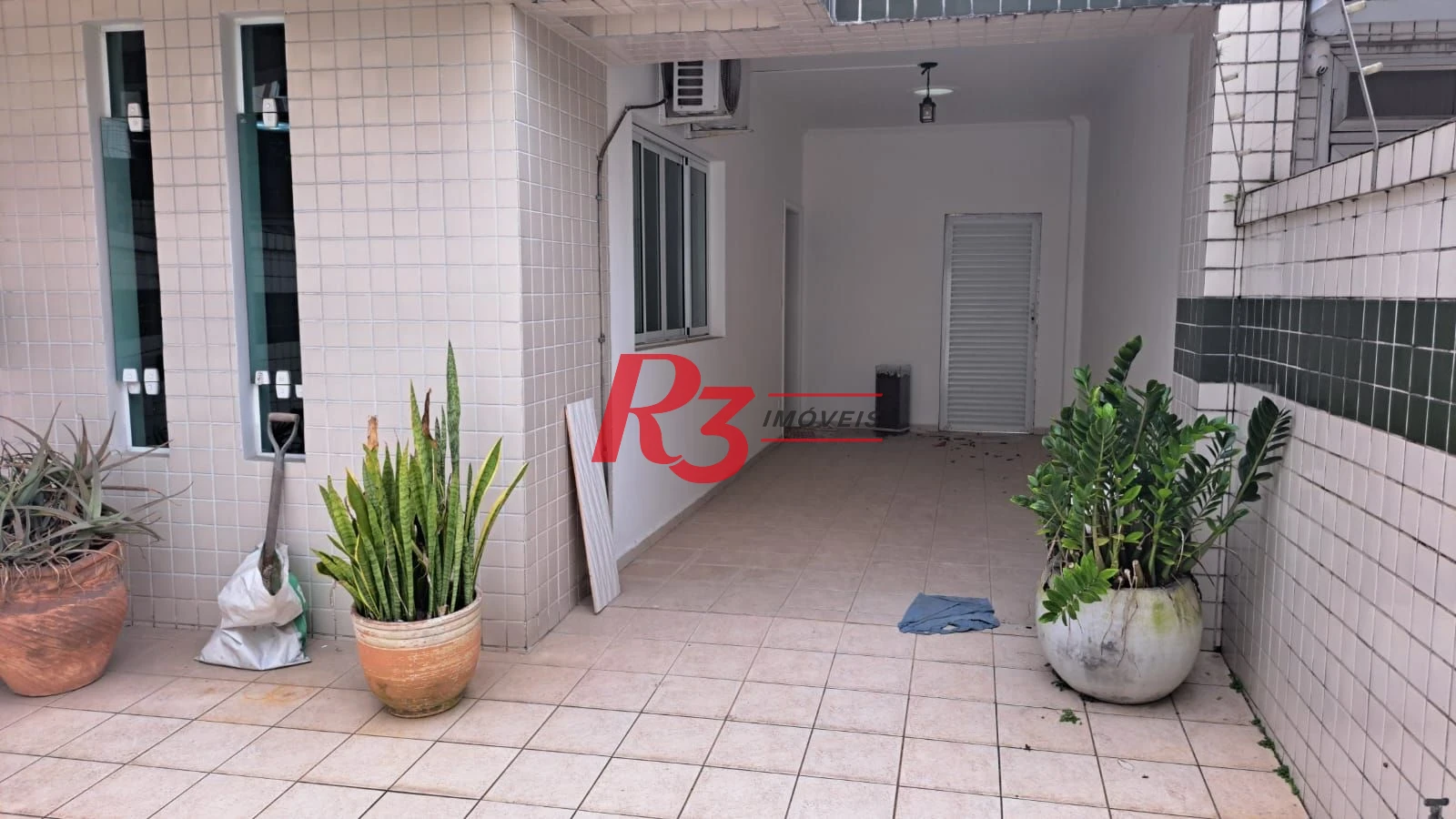 Casa com 5 dormitórios à venda, 263 m² por R$ 2.300.000,00 - Ponta da Praia - Santos/SP