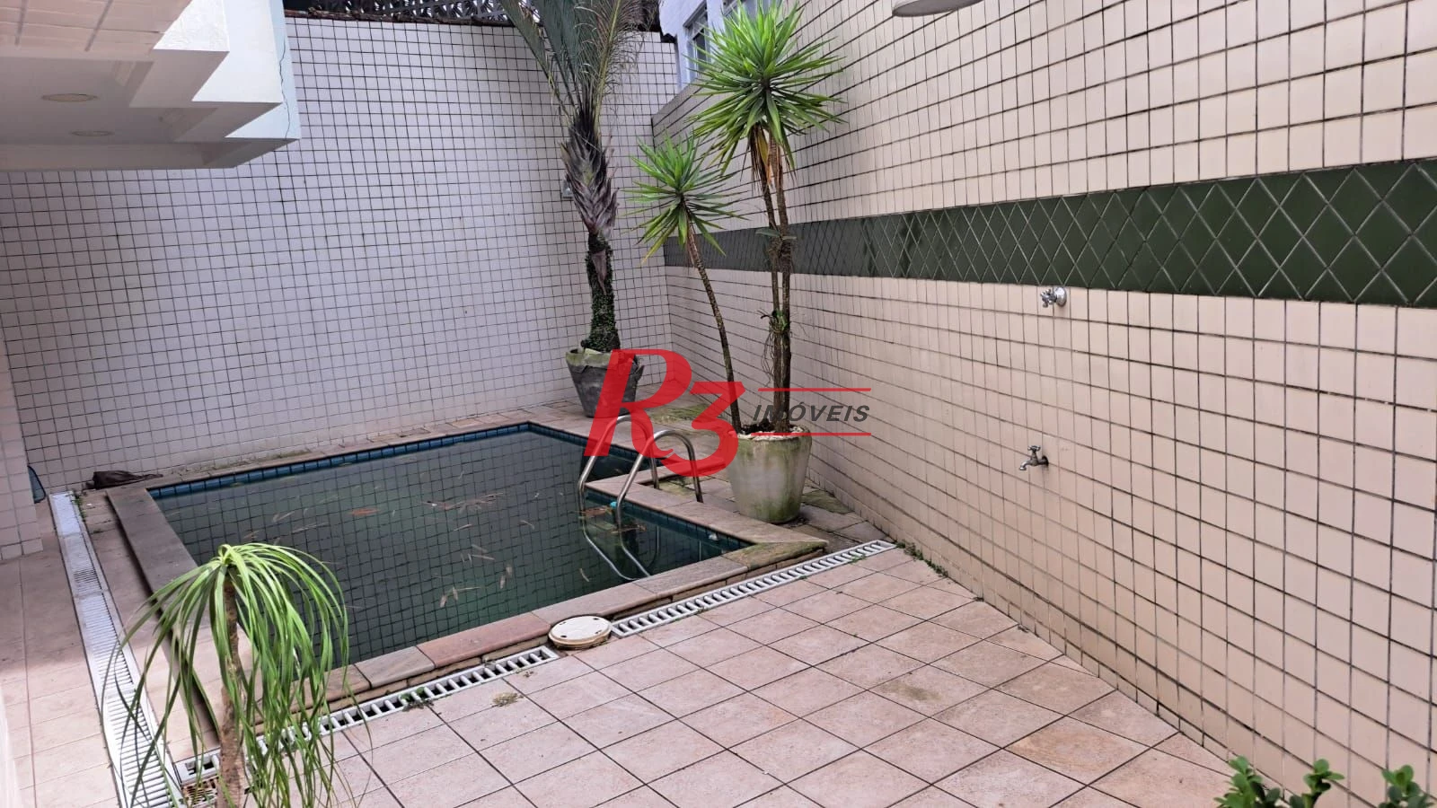 Casa com 5 dormitórios à venda, 263 m² por R$ 2.300.000,00 - Ponta da Praia - Santos/SP