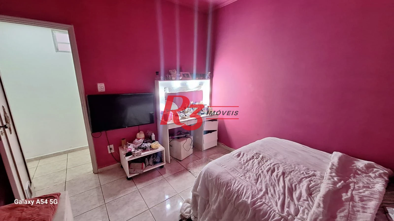 Casa com 3 dormitórios à venda, 109 m² por R$ 850.000,00 - Embaré - Santos/SP