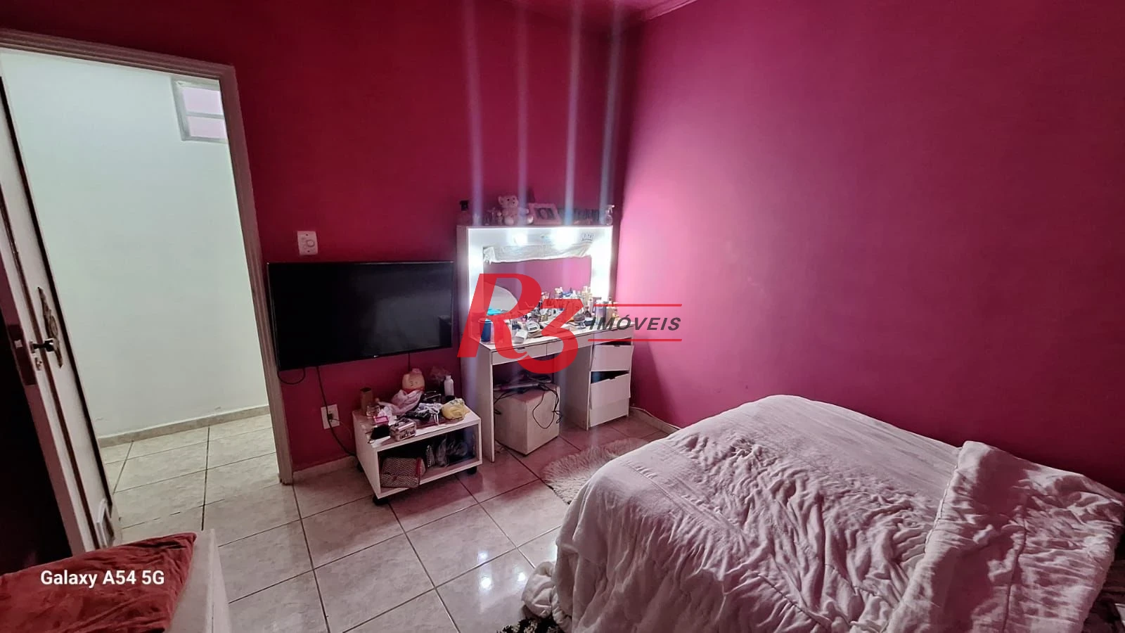 Casa com 3 dormitórios à venda, 109 m² por R$ 850.000,00 - Embaré - Santos/SP