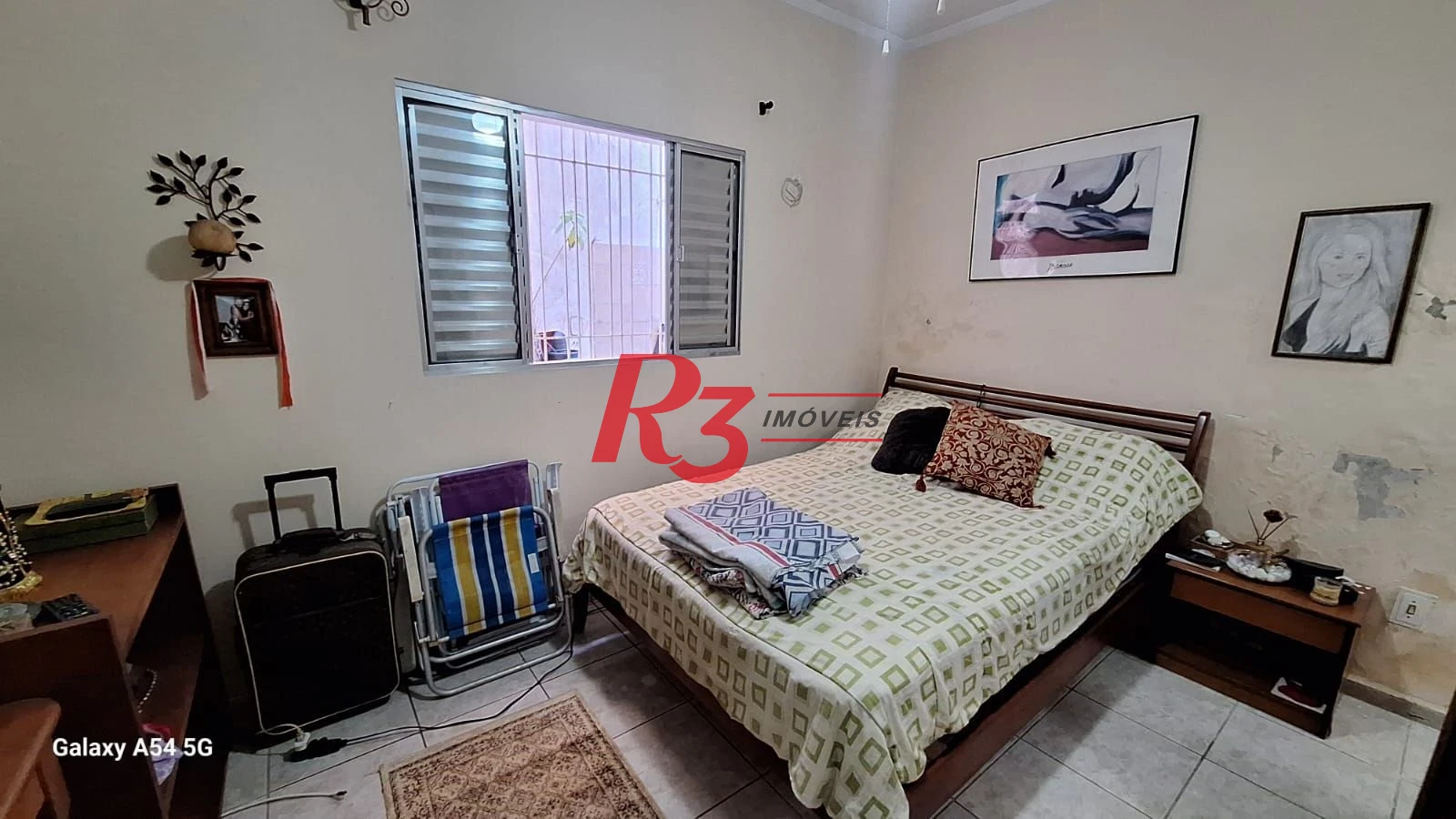 Casa com 3 dormitórios à venda, 109 m² por R$ 850.000,00 - Embaré - Santos/SP