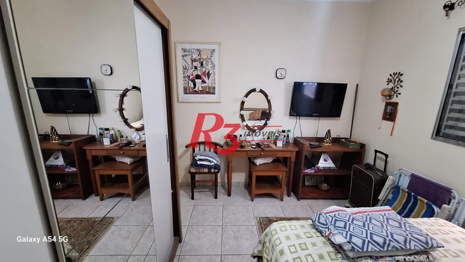 Casa com 3 dormitórios à venda, 109 m² por R$ 850.000,00 - Embaré - Santos/SP