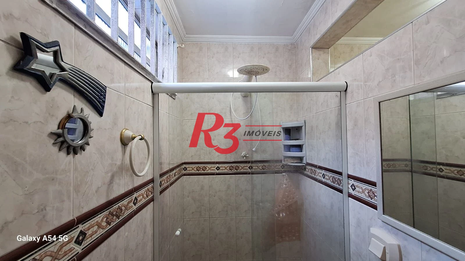 Casa com 3 dormitórios à venda, 109 m² por R$ 850.000,00 - Embaré - Santos/SP
