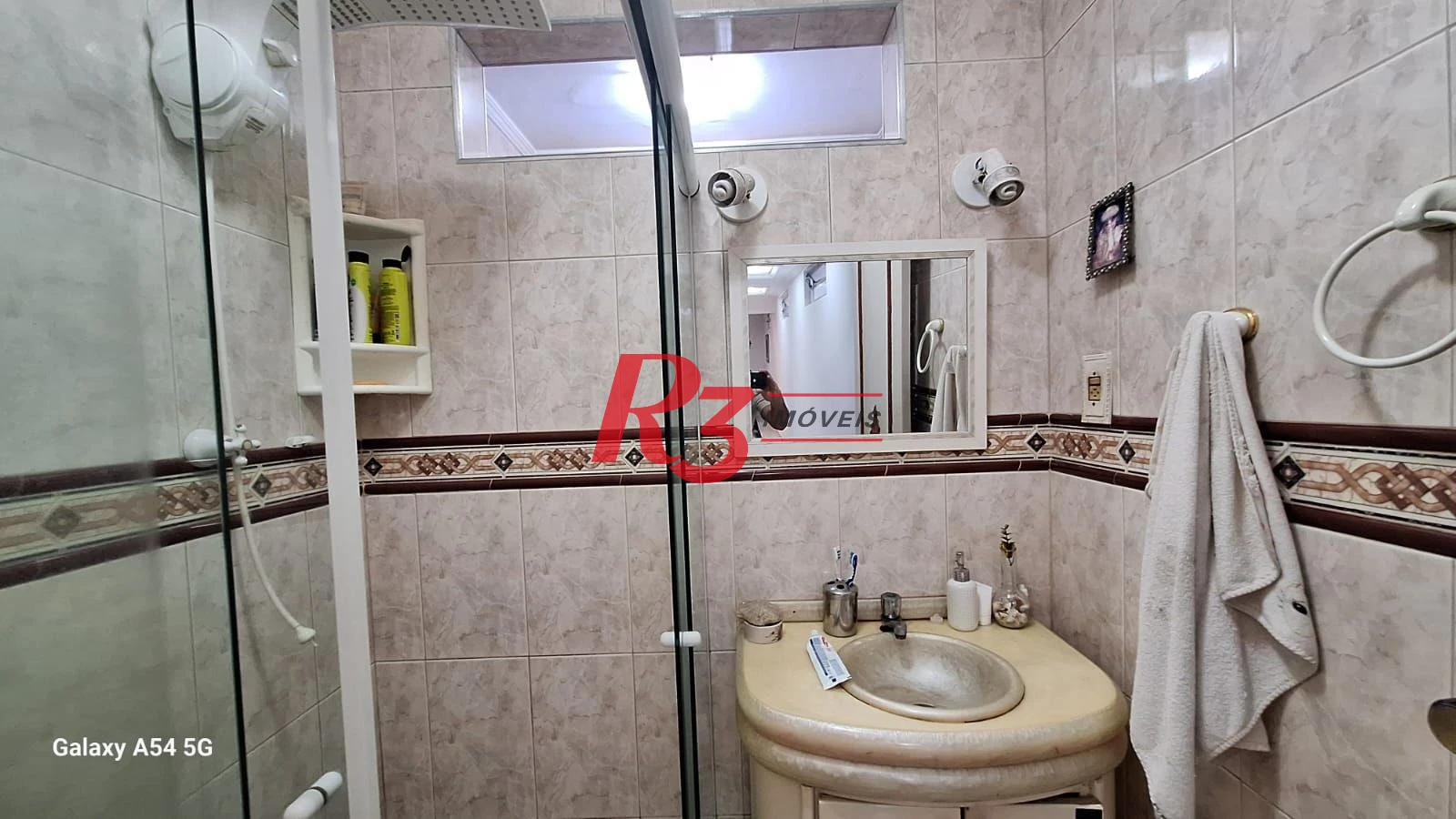 Casa com 3 dormitórios à venda, 109 m² por R$ 850.000,00 - Embaré - Santos/SP