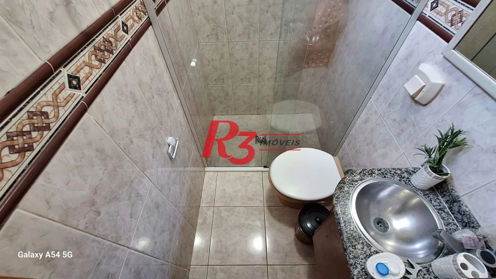 Casa com 3 dormitórios à venda, 109 m² por R$ 850.000,00 - Embaré - Santos/SP