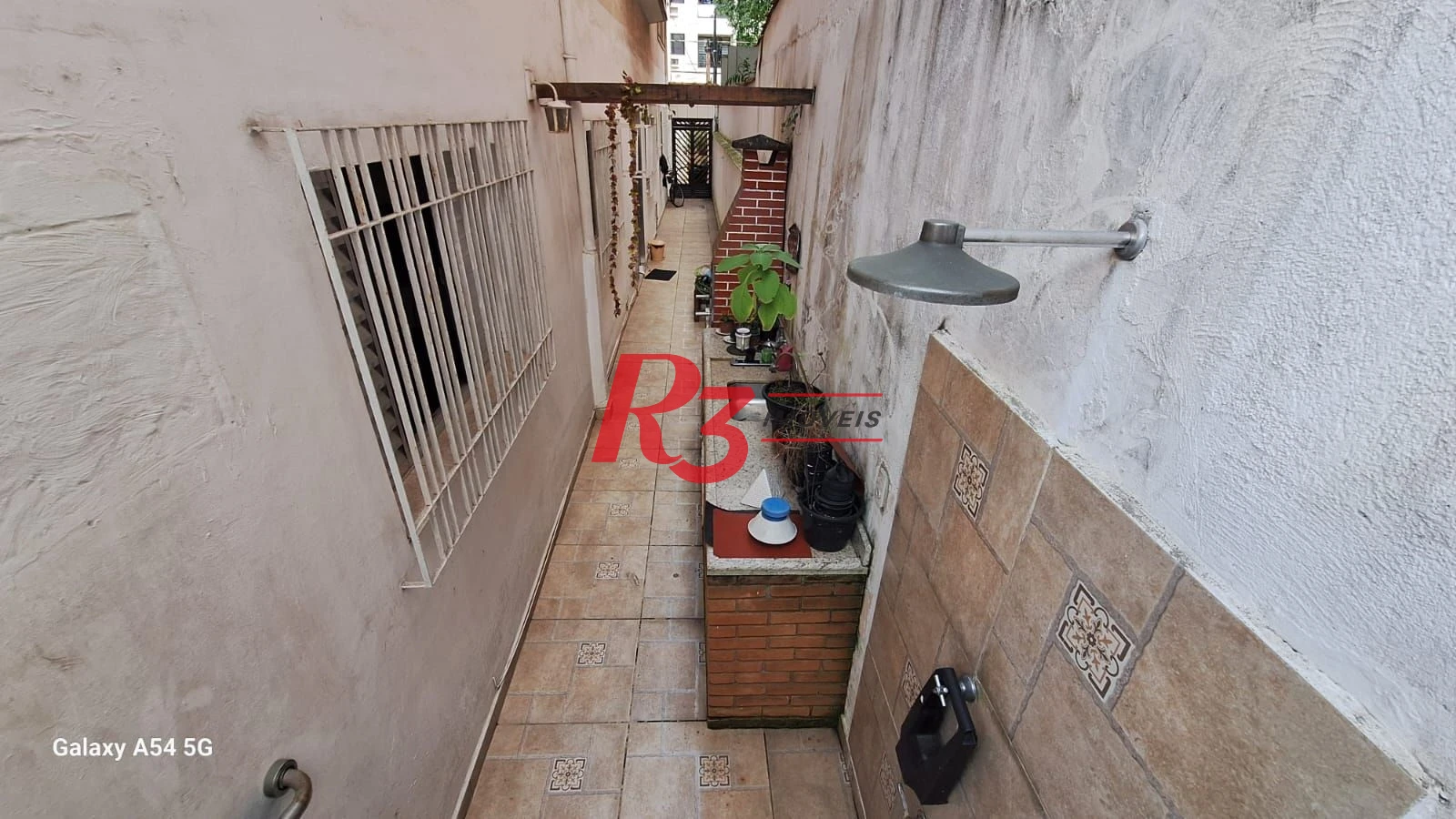 Casa com 3 dormitórios à venda, 109 m² por R$ 850.000,00 - Embaré - Santos/SP