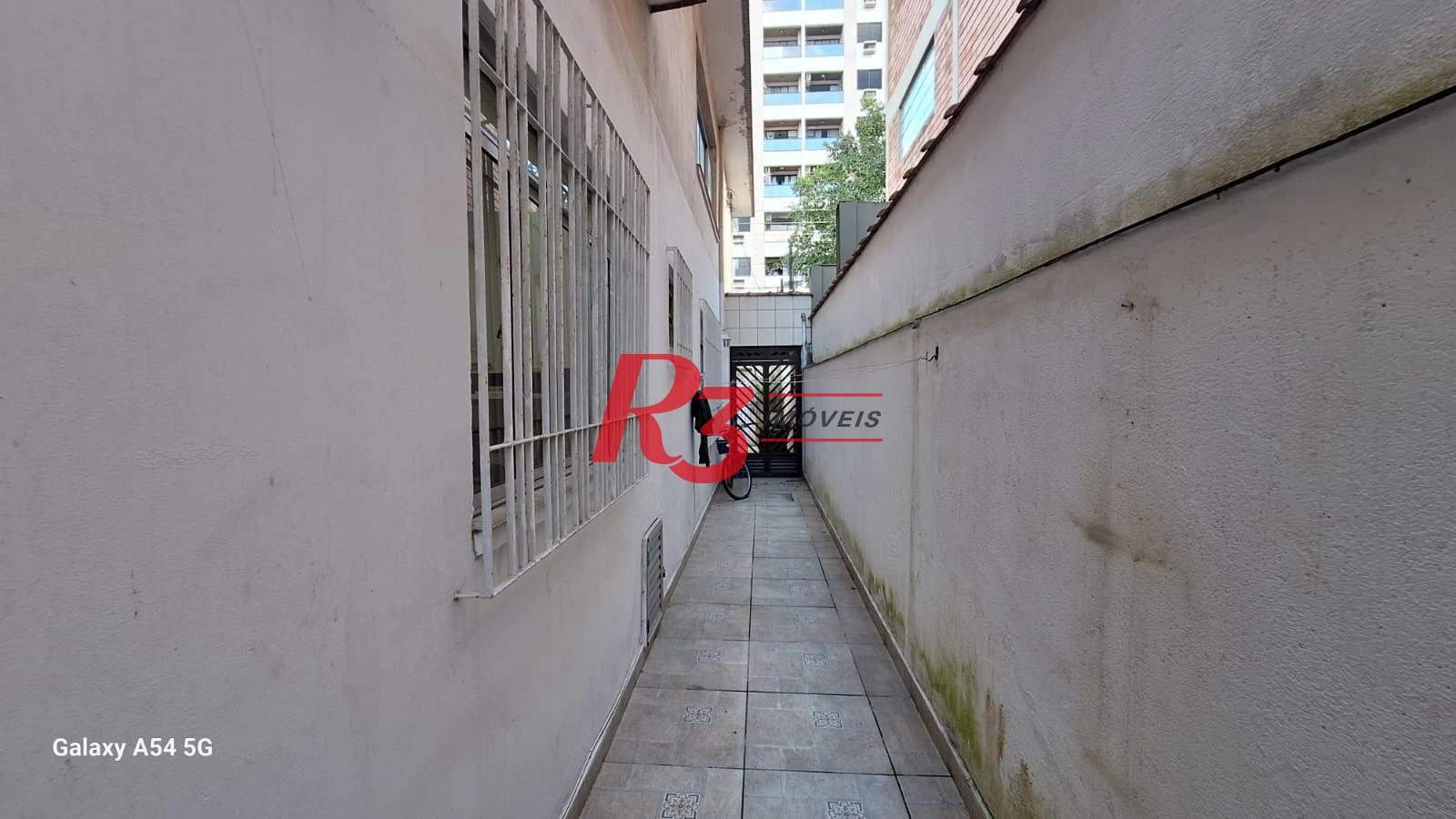 Casa com 3 dormitórios à venda, 109 m² por R$ 850.000,00 - Embaré - Santos/SP