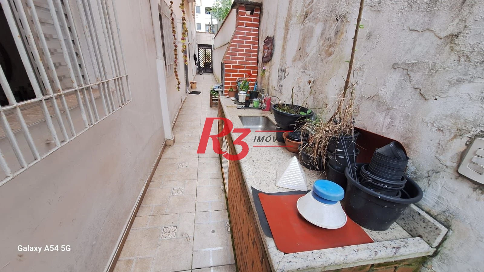 Casa com 3 dormitórios à venda, 109 m² por R$ 850.000,00 - Embaré - Santos/SP