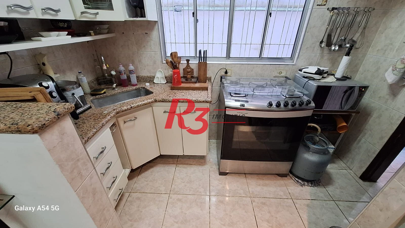 Casa com 3 dormitórios à venda, 109 m² por R$ 850.000,00 - Embaré - Santos/SP