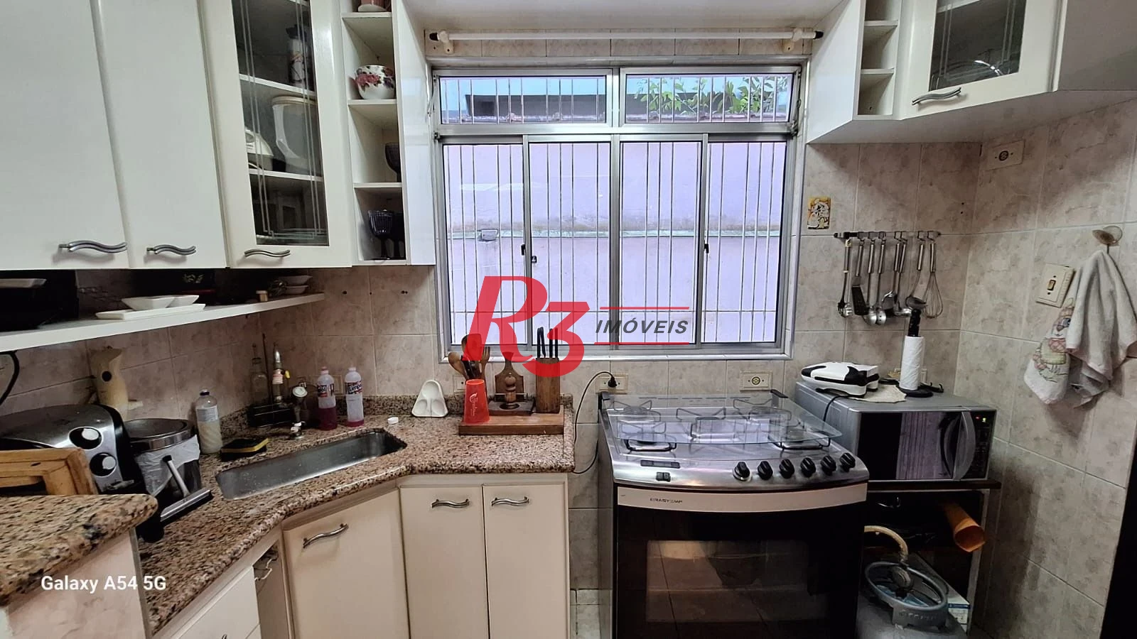 Casa com 3 dormitórios à venda, 109 m² por R$ 850.000,00 - Embaré - Santos/SP