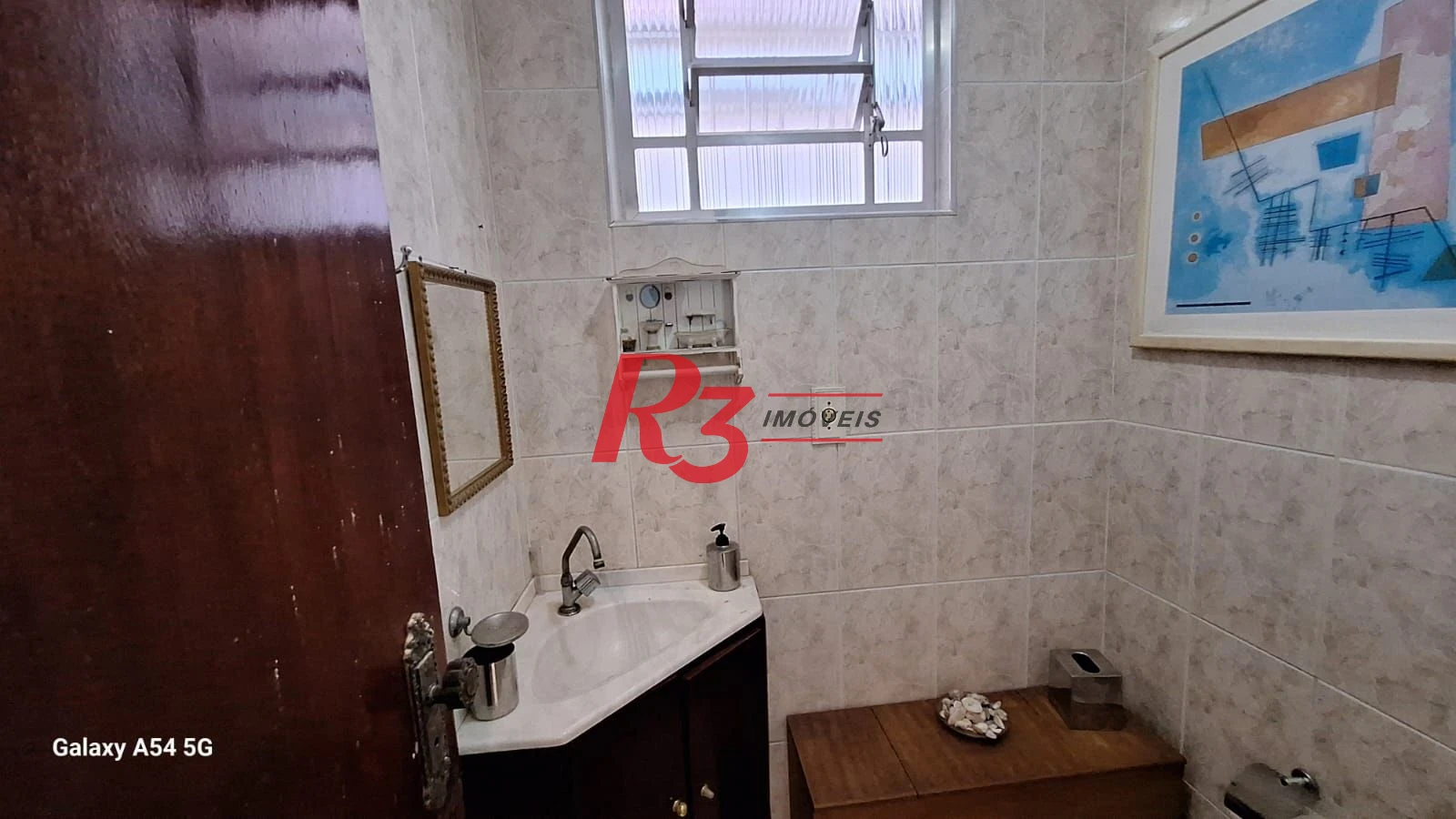 Casa com 3 dormitórios à venda, 109 m² por R$ 850.000,00 - Embaré - Santos/SP