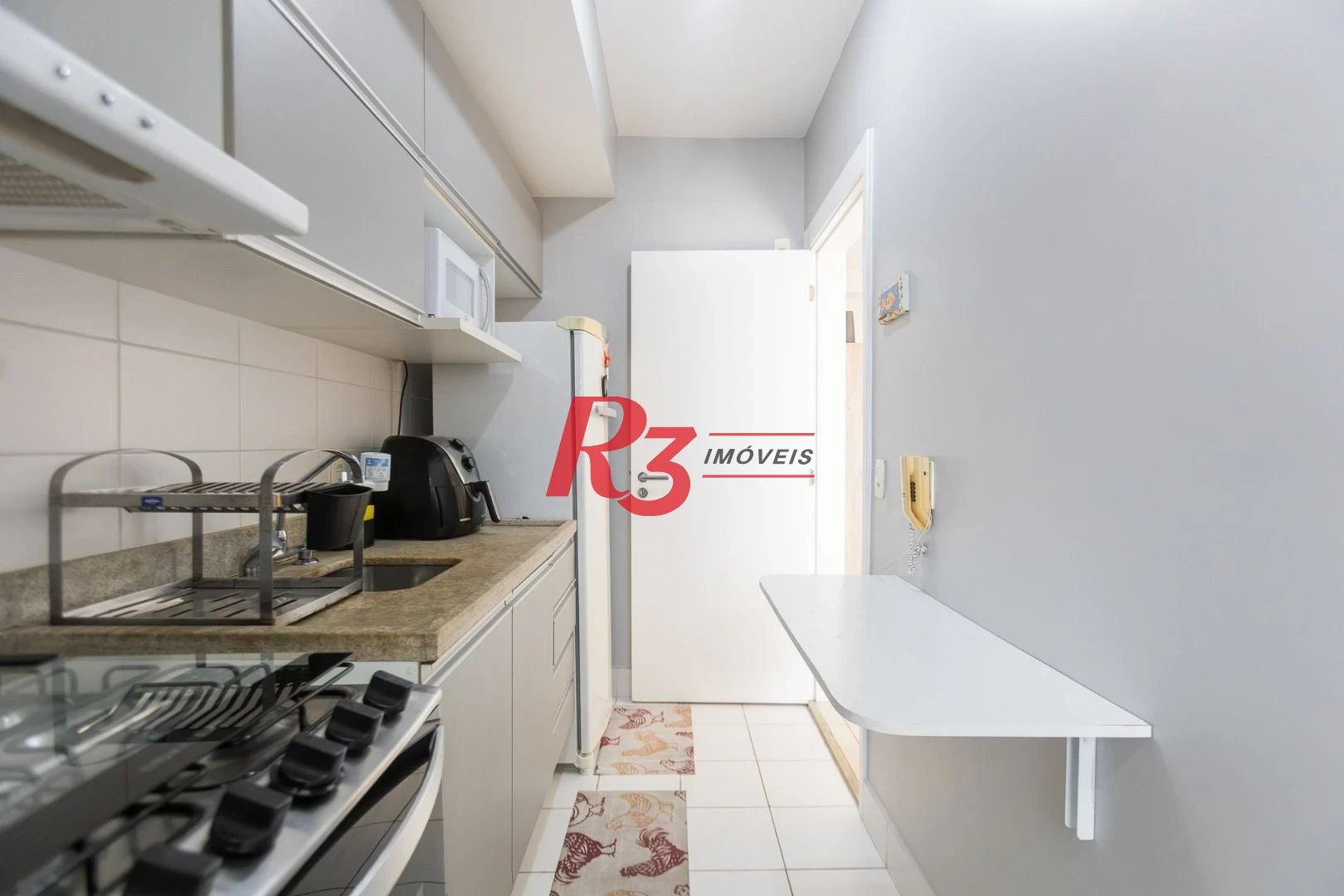 Apartamento com 1 dormitório para alugar, 47 m² por R$ 5.300,02/mês - Boqueirão - Santos/SP