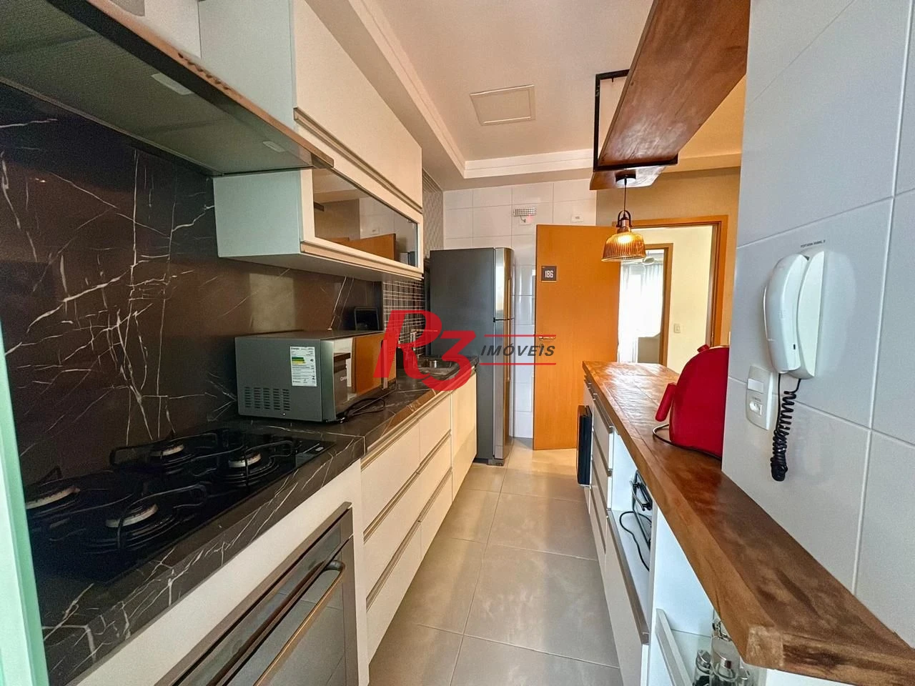 Apartamento com 2 dormitórios à venda, 73 m² por R$ 1.650.000,00 - Gonzaga - Santos/SP