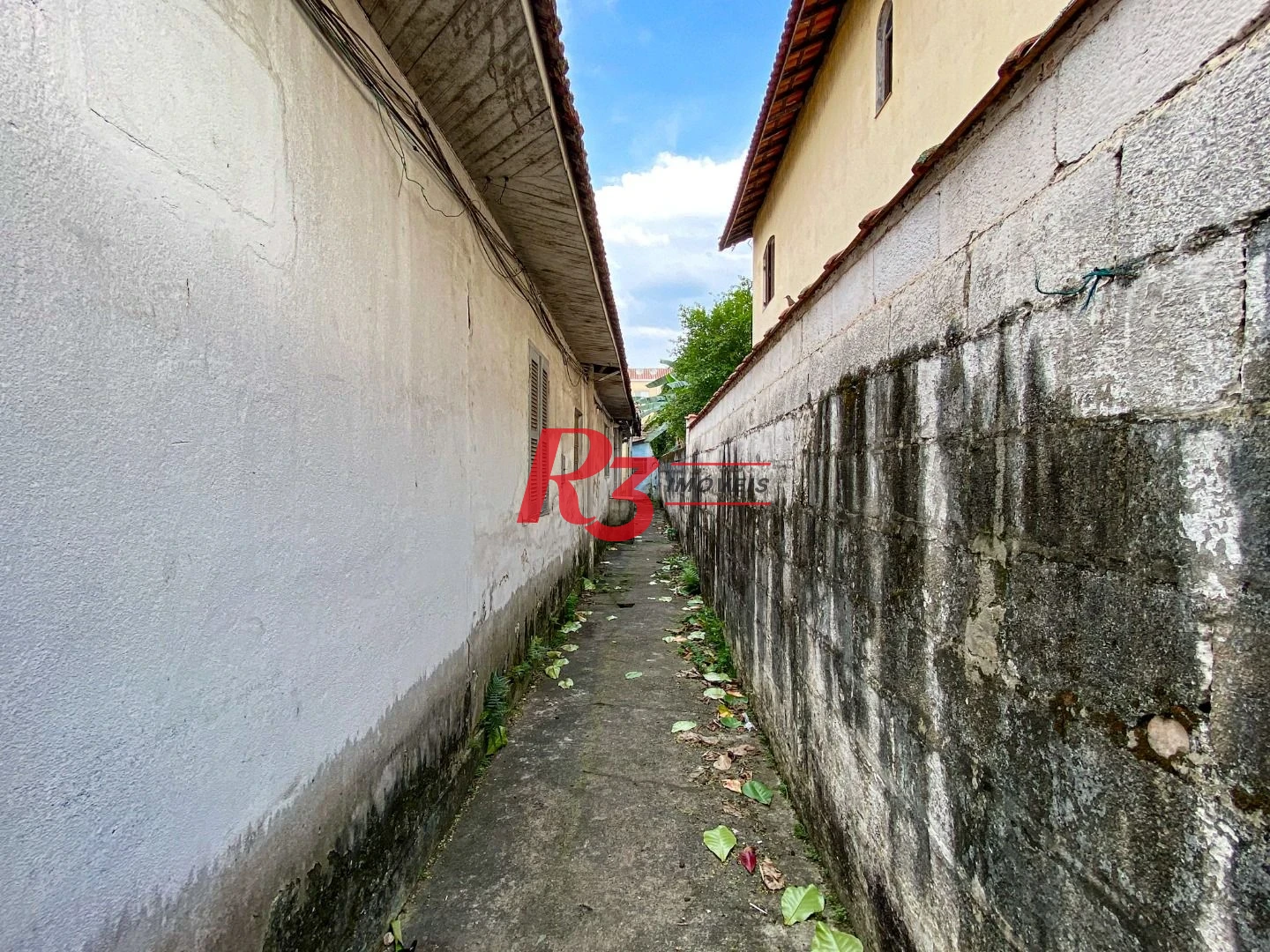 Casa com 3 dormitórios à venda, 360 m² por R$ 1.500.000,00 - Estuário - Santos/SP