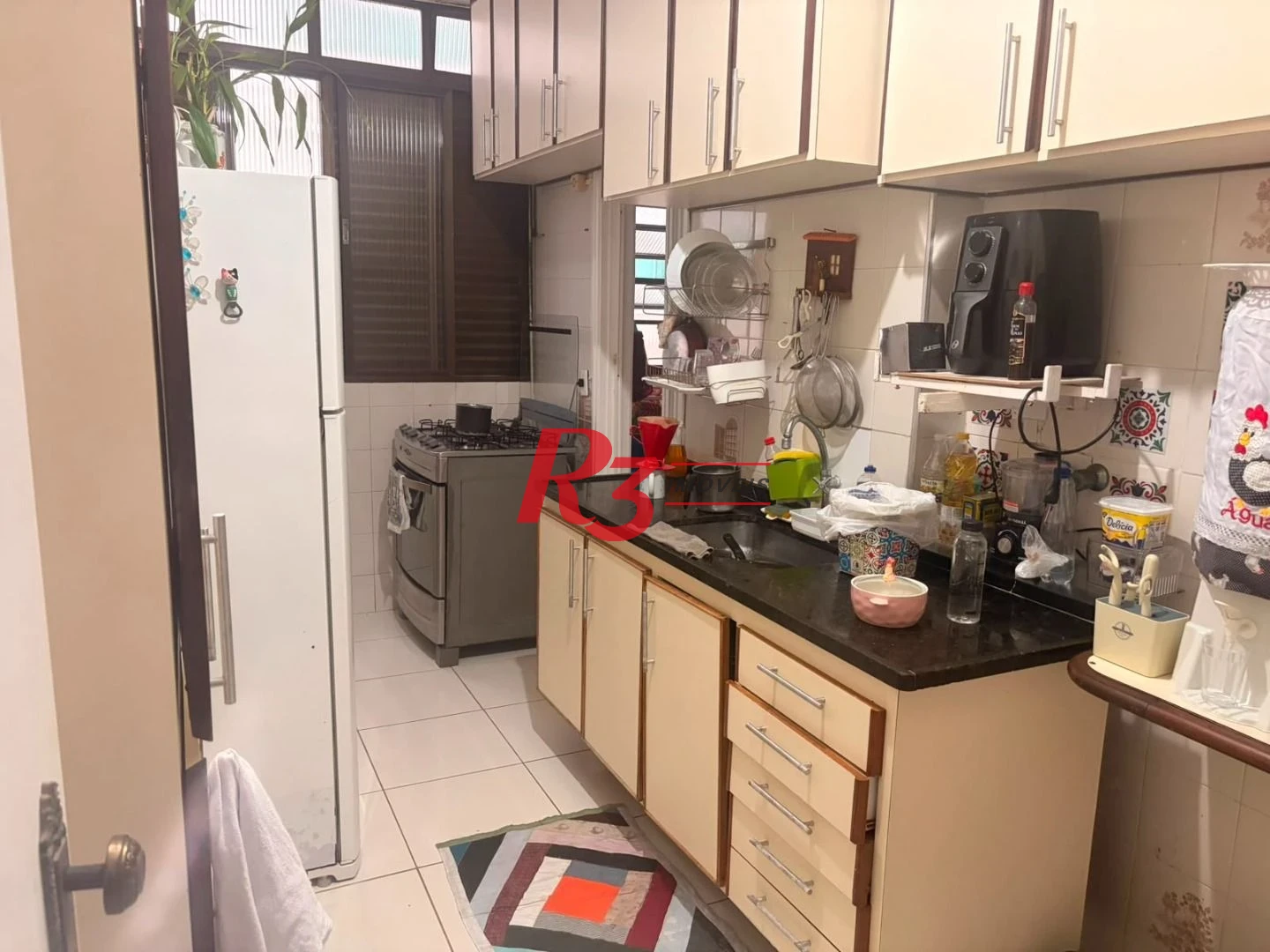 Apartamento com 3 dormitórios à venda, 106 m² por R$ 933.000,00 - Gonzaga - Santos/SP