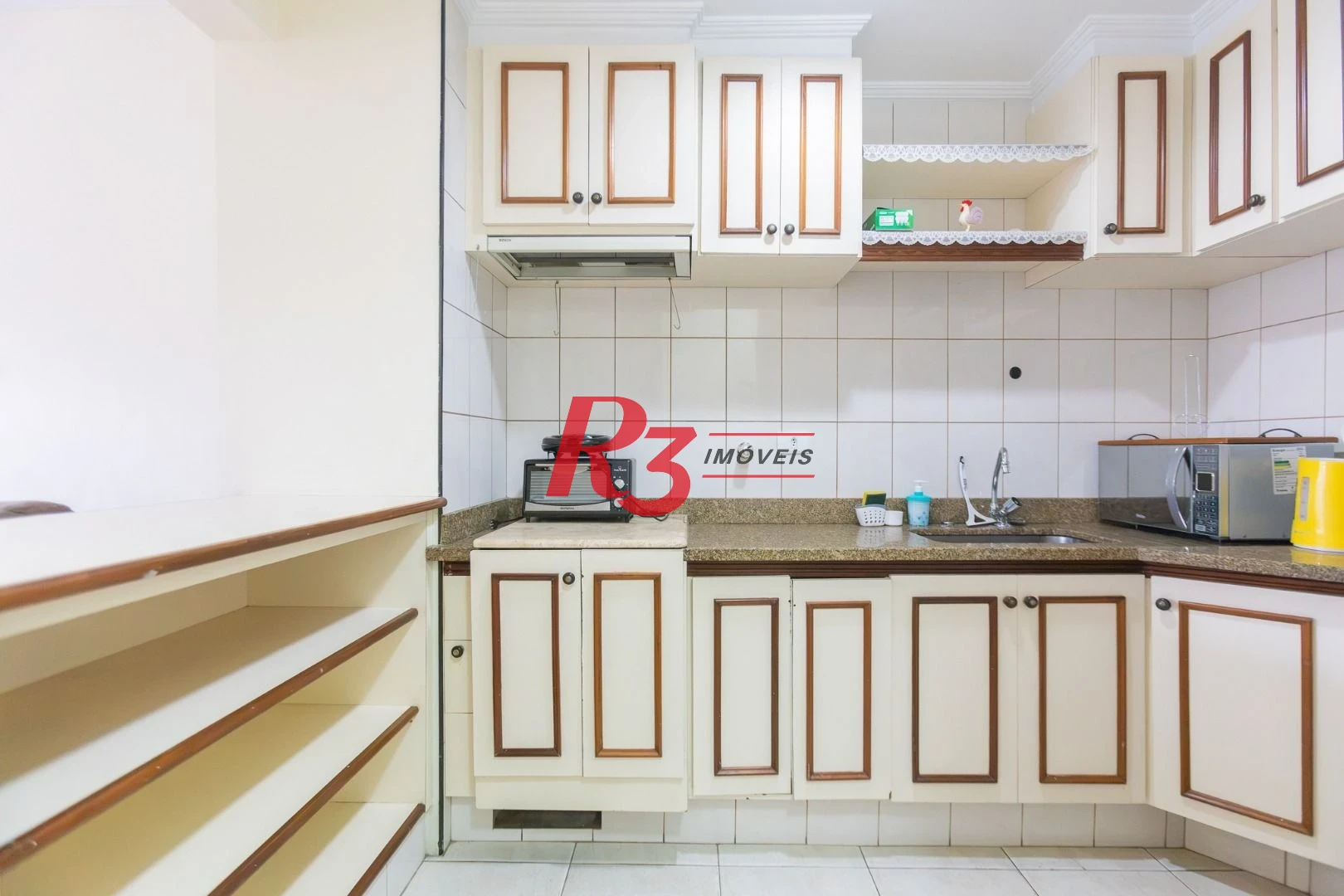 Flat com 2 dormitórios à venda, 70 m² por R$ 520.000,00 - Gonzaga - Santos/SP
