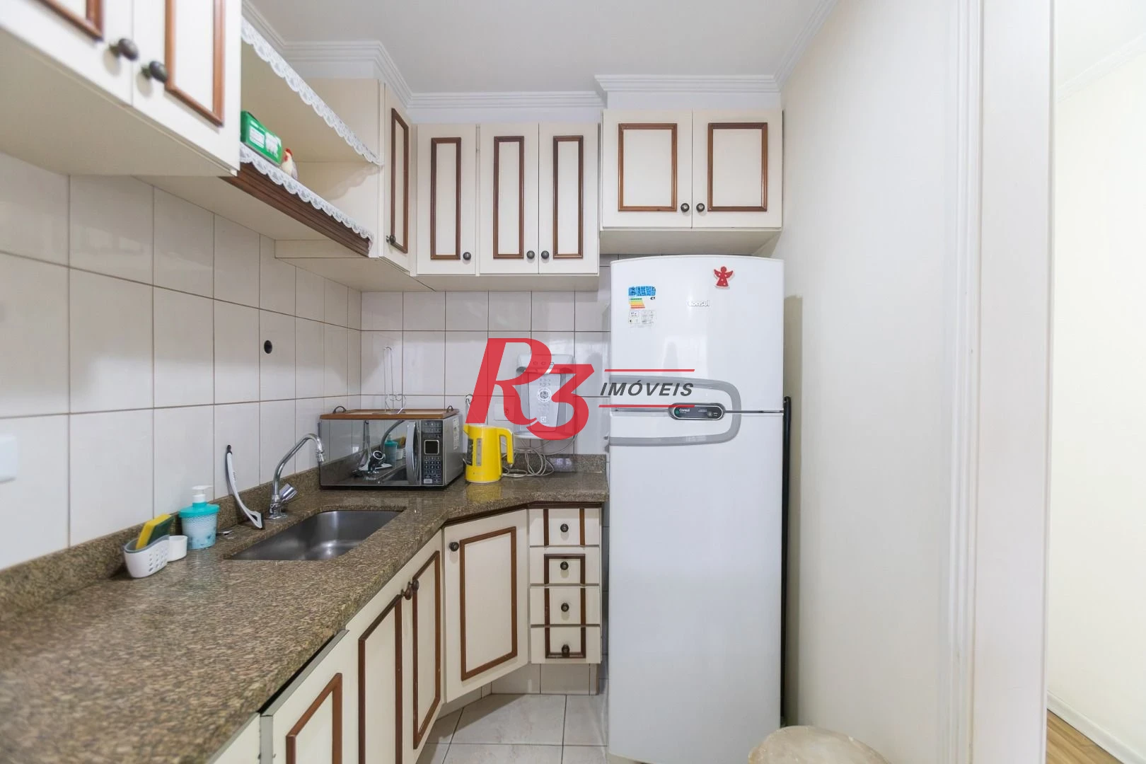 Flat com 2 dormitórios à venda, 70 m² por R$ 520.000,00 - Gonzaga - Santos/SP