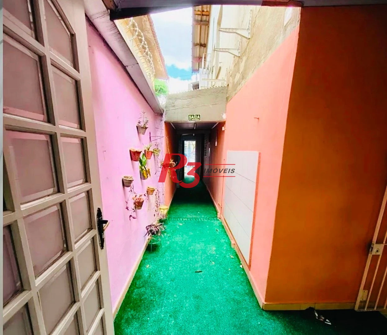 Casa com 3 dormitórios, 179 m² - venda por R$ 1.660.000,00 ou aluguel por R$ 9.270,00/mês - Gonzaga - Santos/SP