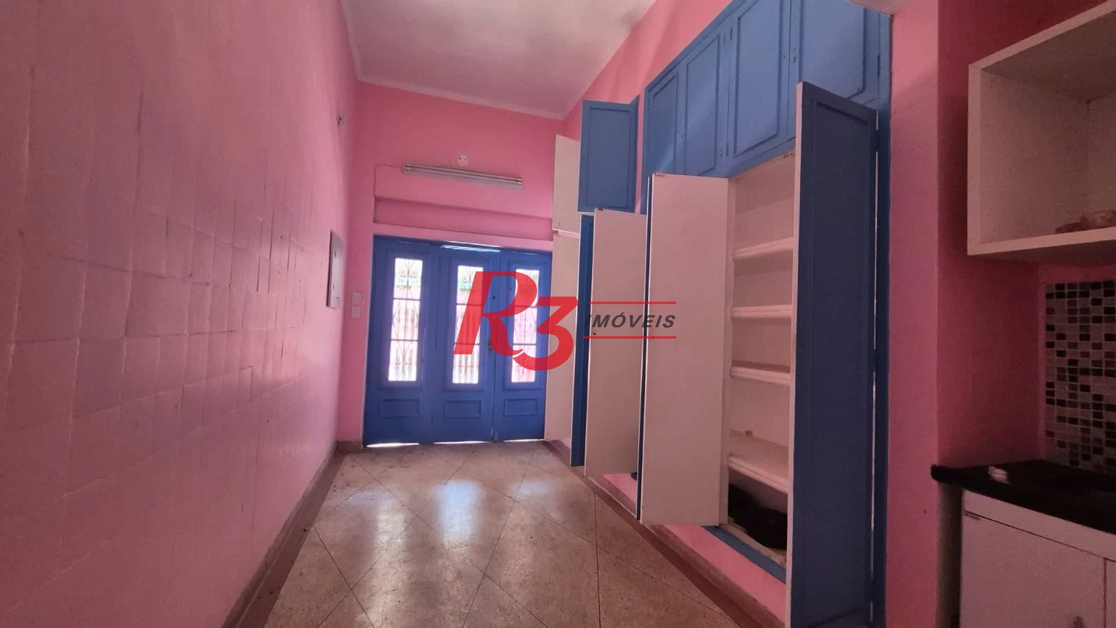 Sobrado com 3 dormitórios à venda, 195 m² por R$ 1.300.000,00 - Gonzaga - Santos/SP