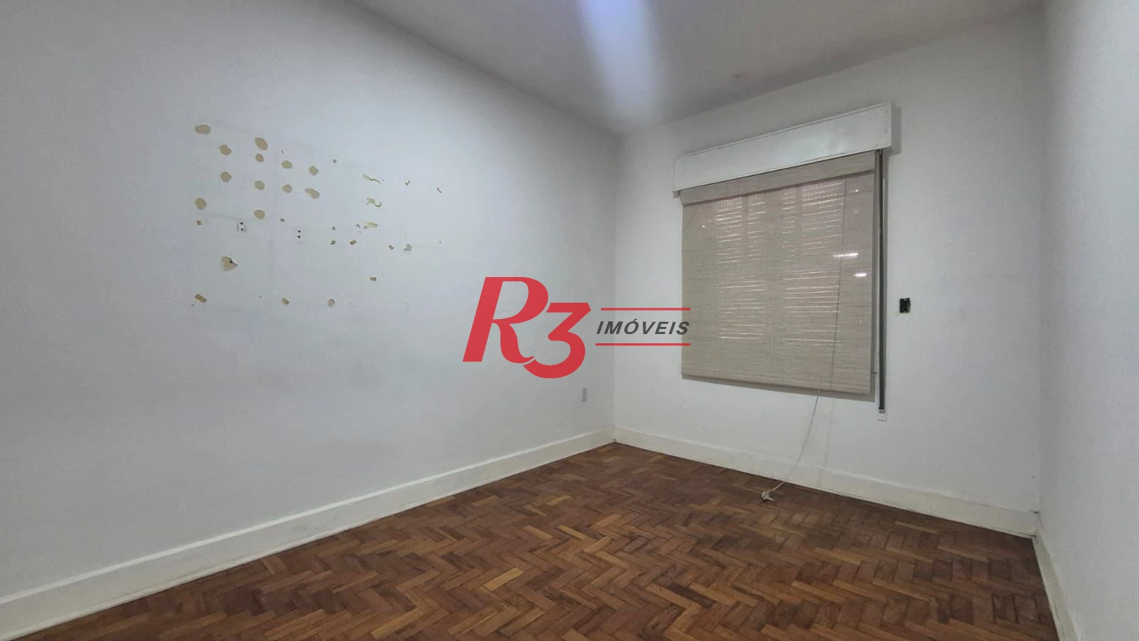 Sobrado com 3 dormitórios à venda, 195 m² por R$ 1.300.000,00 - Gonzaga - Santos/SP