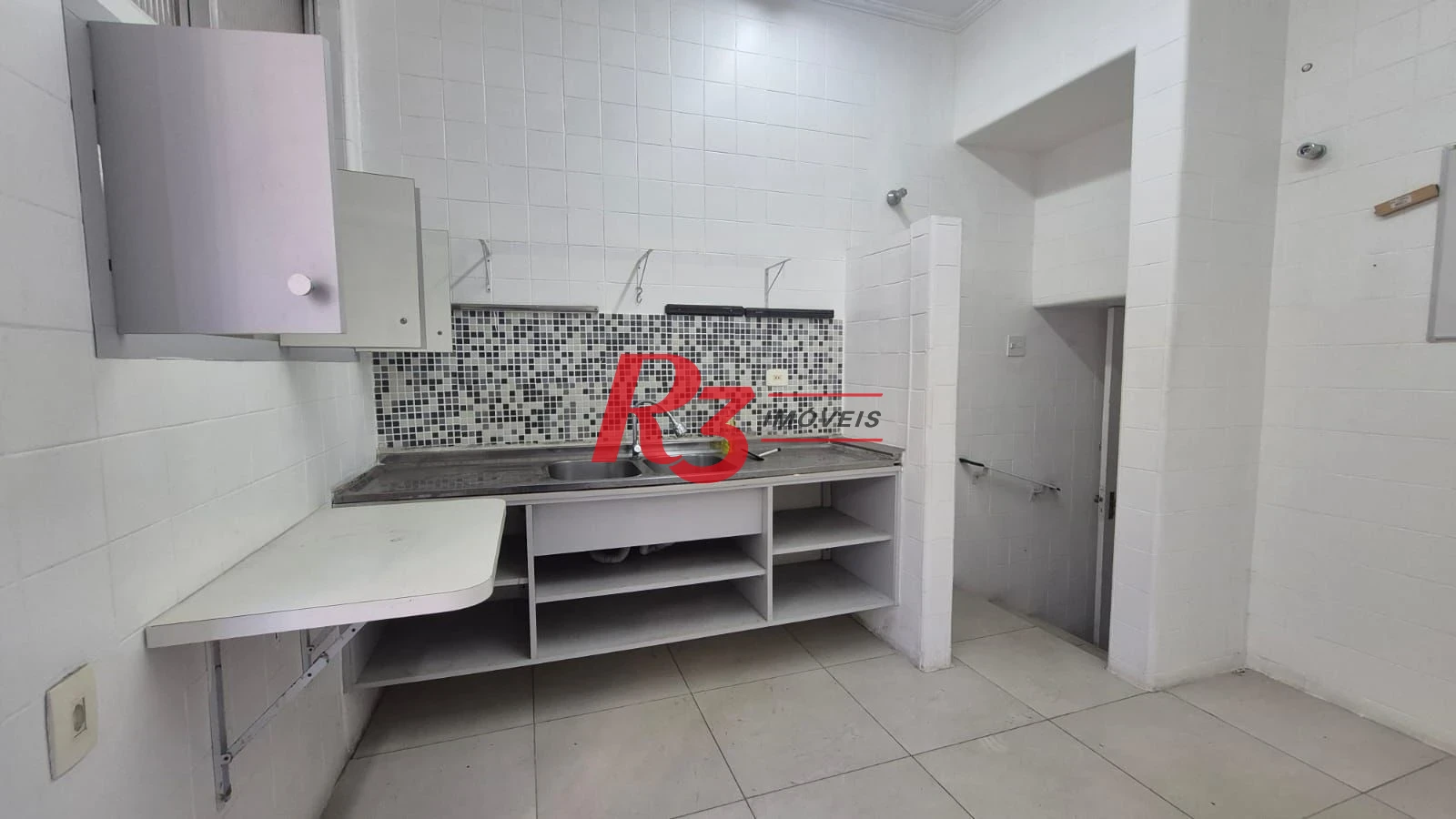 Sobrado com 3 dormitórios à venda, 195 m² por R$ 1.300.000,00 - Gonzaga - Santos/SP