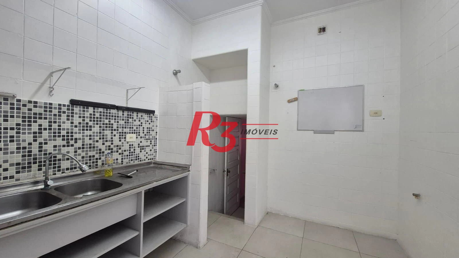 Sobrado com 3 dormitórios à venda, 195 m² por R$ 1.300.000,00 - Gonzaga - Santos/SP