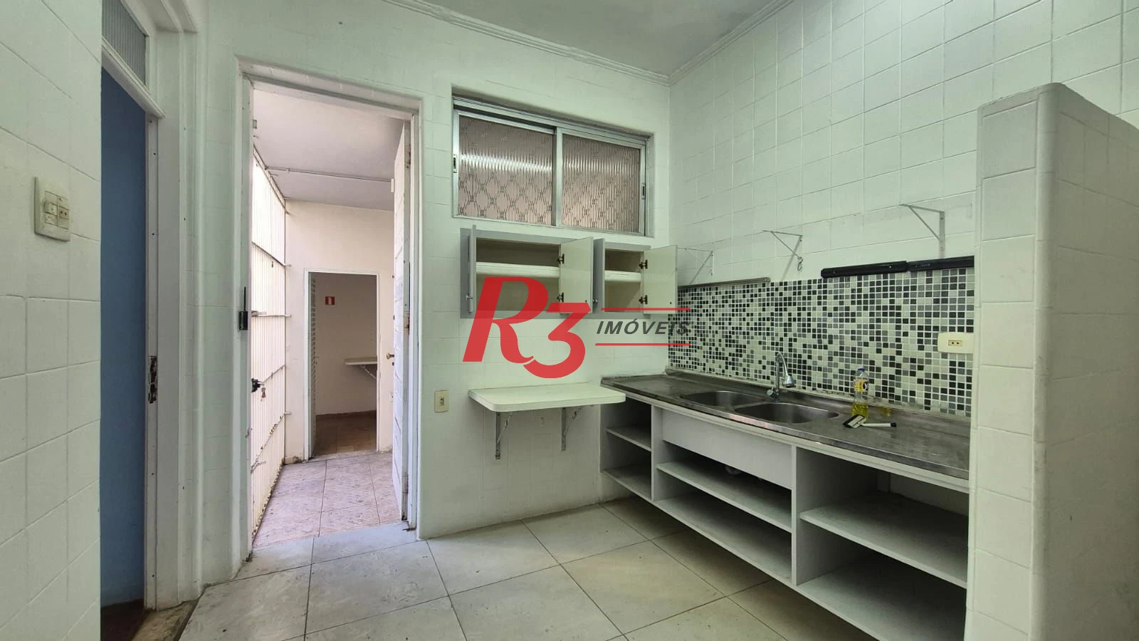 Sobrado com 3 dormitórios à venda, 195 m² por R$ 1.300.000,00 - Gonzaga - Santos/SP