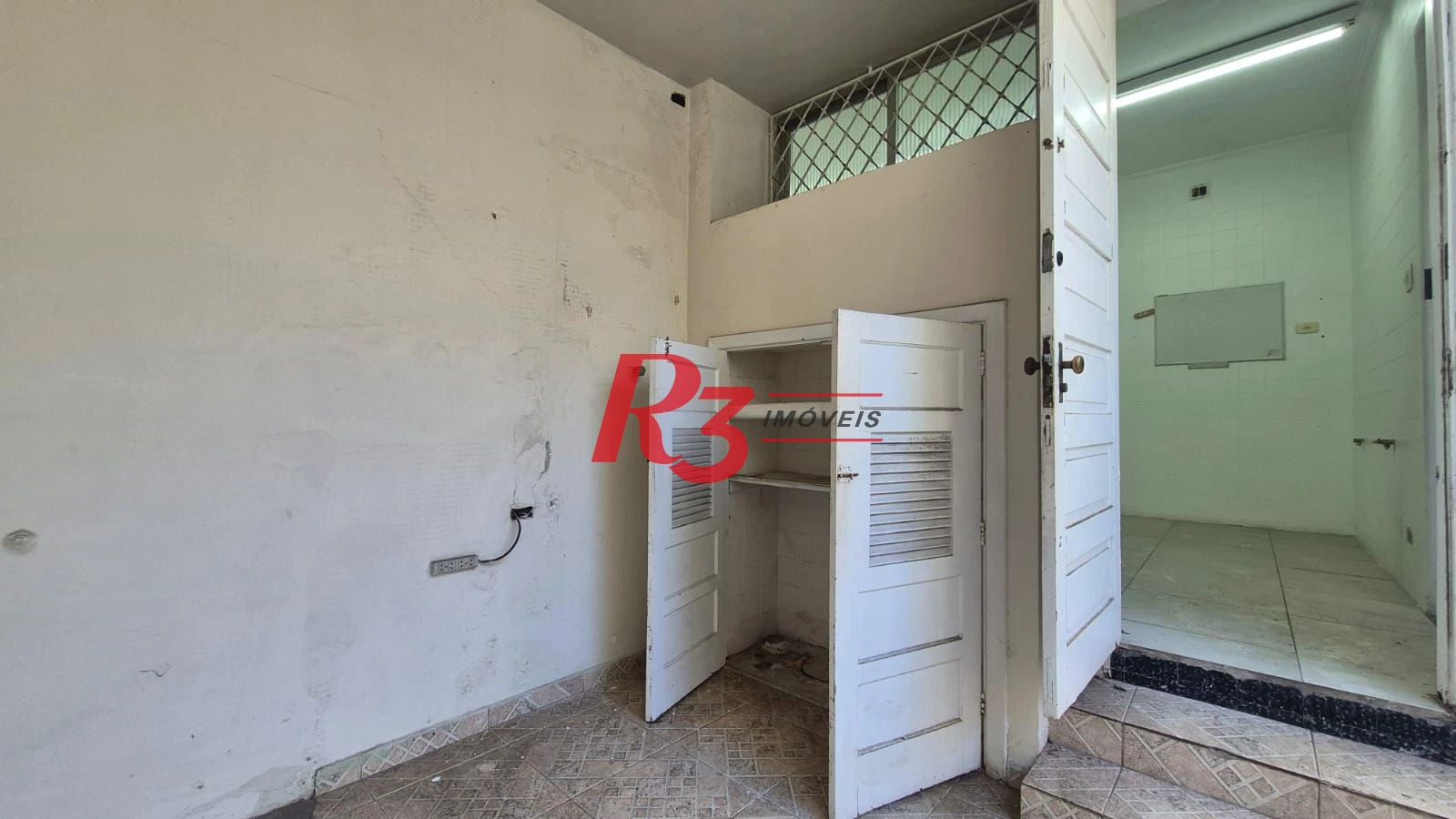 Sobrado com 3 dormitórios à venda, 195 m² por R$ 1.300.000,00 - Gonzaga - Santos/SP