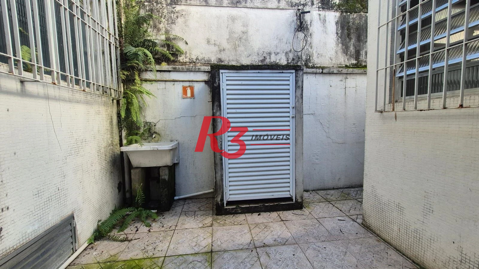 Sobrado com 3 dormitórios à venda, 195 m² por R$ 1.300.000,00 - Gonzaga - Santos/SP