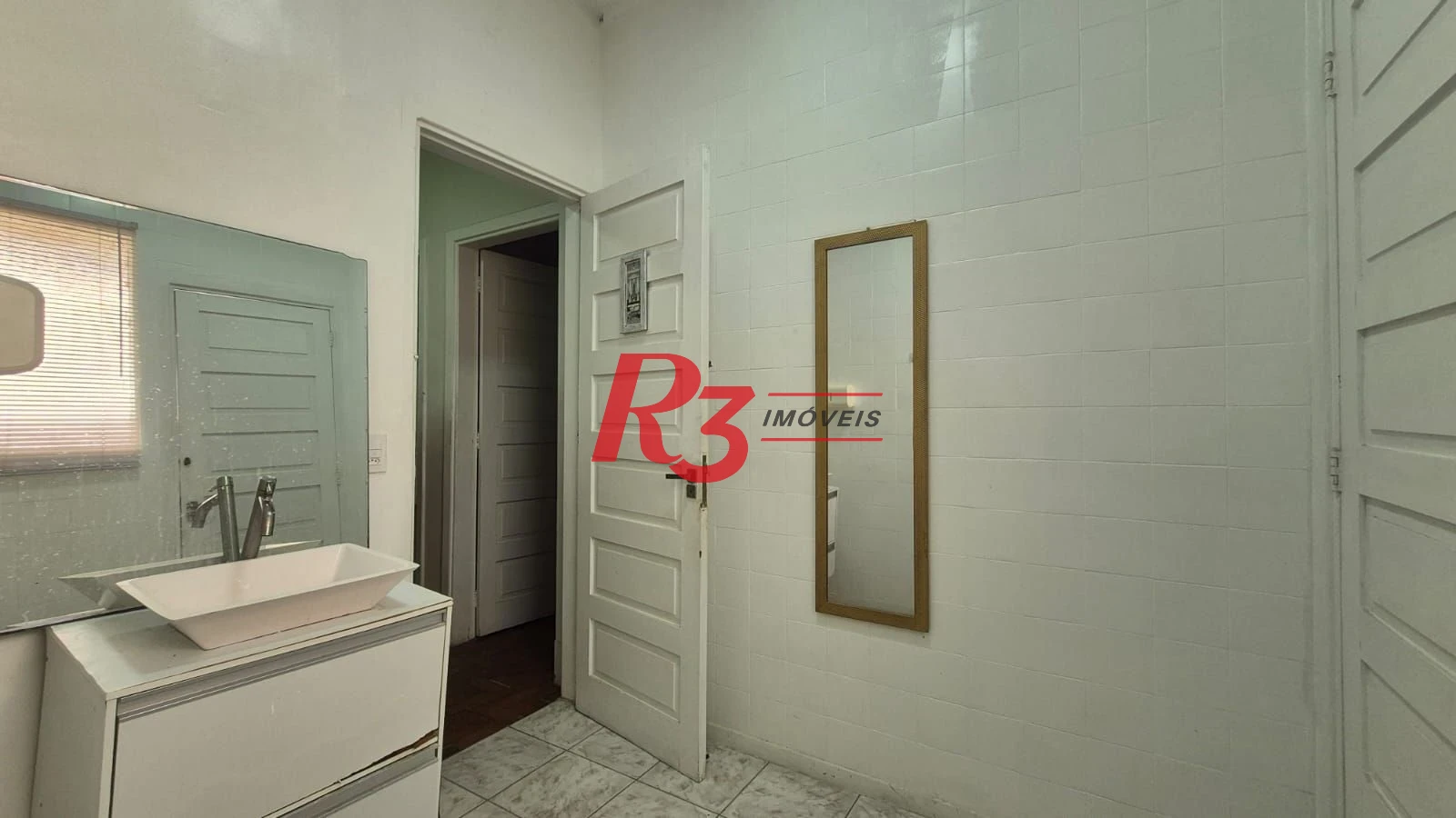 Sobrado com 3 dormitórios à venda, 195 m² por R$ 1.300.000,00 - Gonzaga - Santos/SP