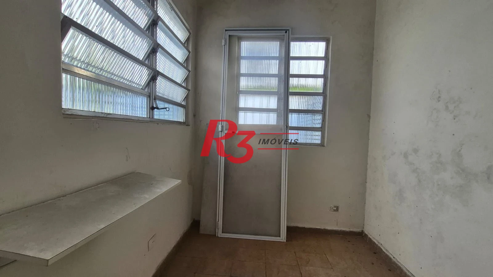 Sobrado com 3 dormitórios à venda, 195 m² por R$ 1.300.000,00 - Gonzaga - Santos/SP