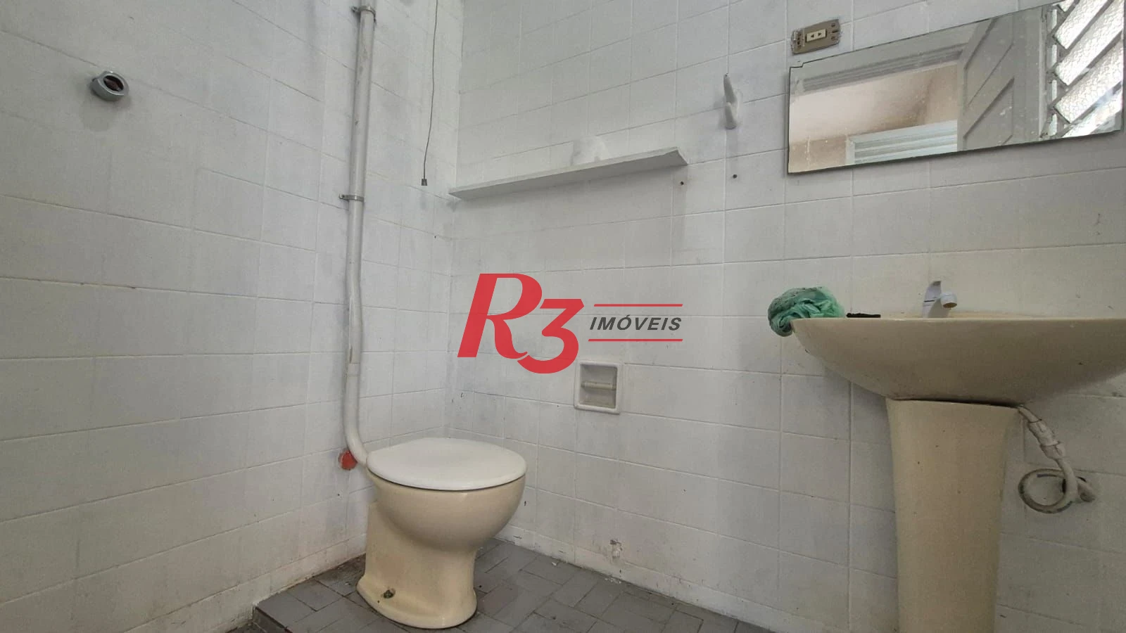 Sobrado com 3 dormitórios à venda, 195 m² por R$ 1.300.000,00 - Gonzaga - Santos/SP