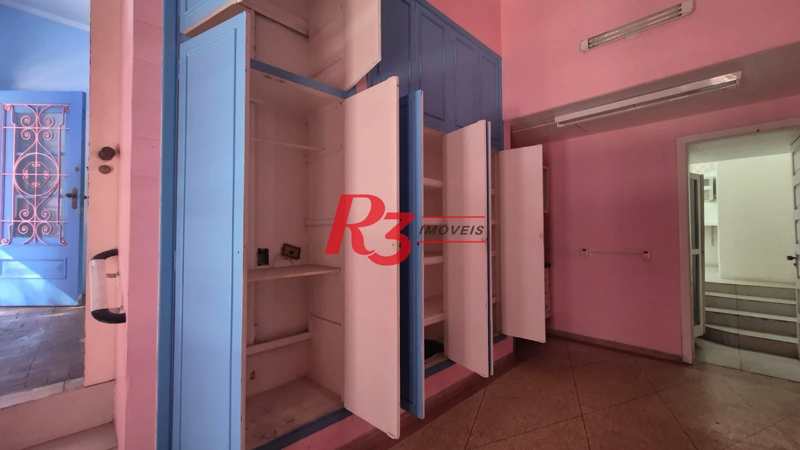 Sobrado com 3 dormitórios à venda, 195 m² por R$ 1.300.000,00 - Gonzaga - Santos/SP