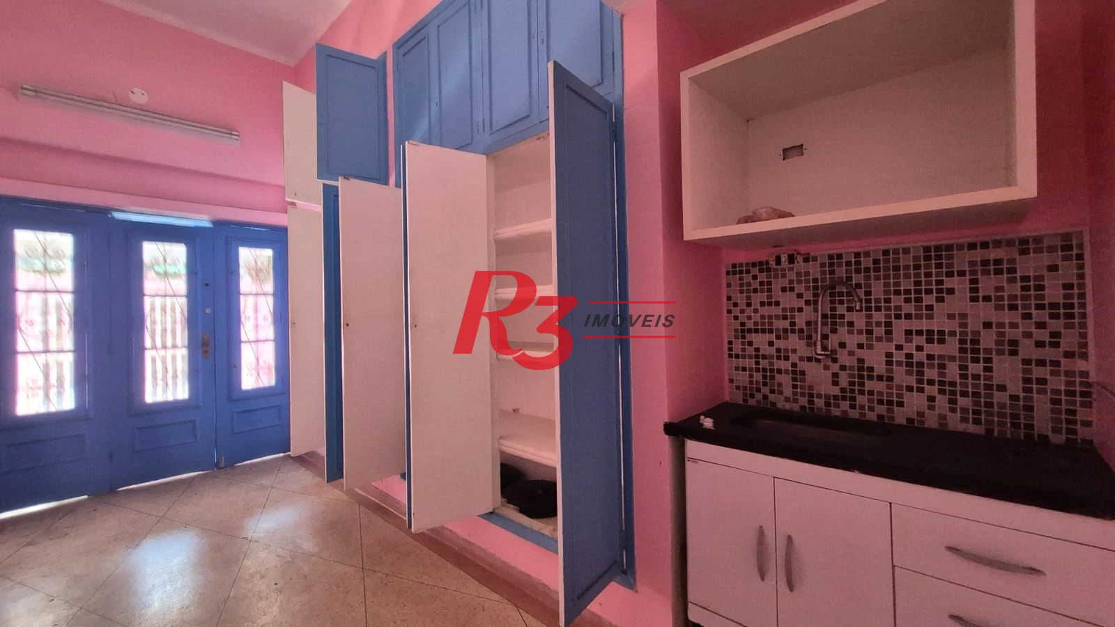 Sobrado com 3 dormitórios à venda, 195 m² por R$ 1.300.000,00 - Gonzaga - Santos/SP