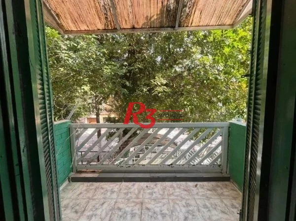 Casa com 3 dormitórios, 350 m² - venda por R$ 1.200.000,00 ou aluguel por R$ 7.500,00/mês - Gonzaga - Santos/SP