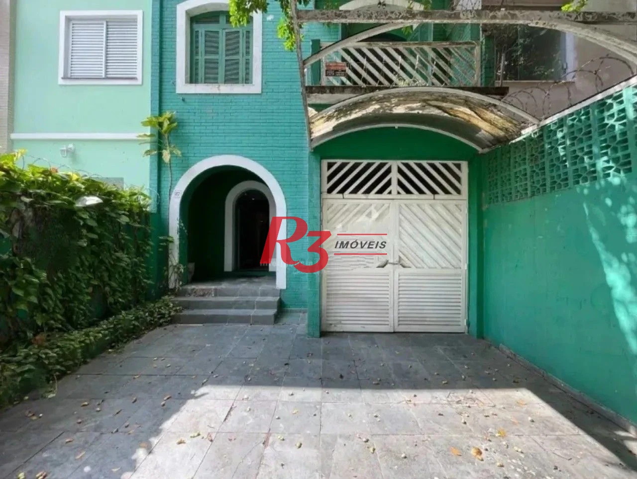 Casa com 3 dormitórios, 350 m² - venda por R$ 1.200.000,00 ou aluguel por R$ 7.500,00/mês - Gonzaga - Santos/SP