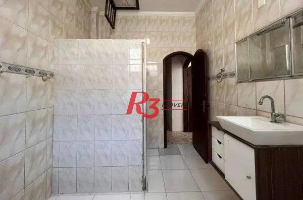 Casa com 3 dormitórios, 350 m² - venda por R$ 1.200.000,00 ou aluguel por R$ 7.500,00/mês - Gonzaga - Santos/SP