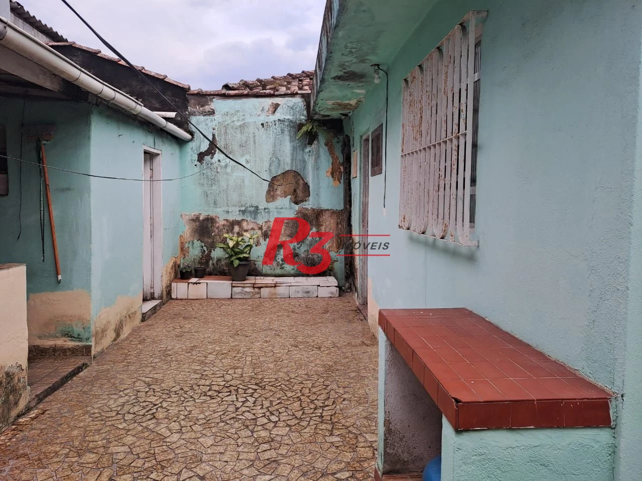 Casa com 2 dormitórios à venda, 131 m² por R$ 300.000,00 - Castelo - Santos/SP