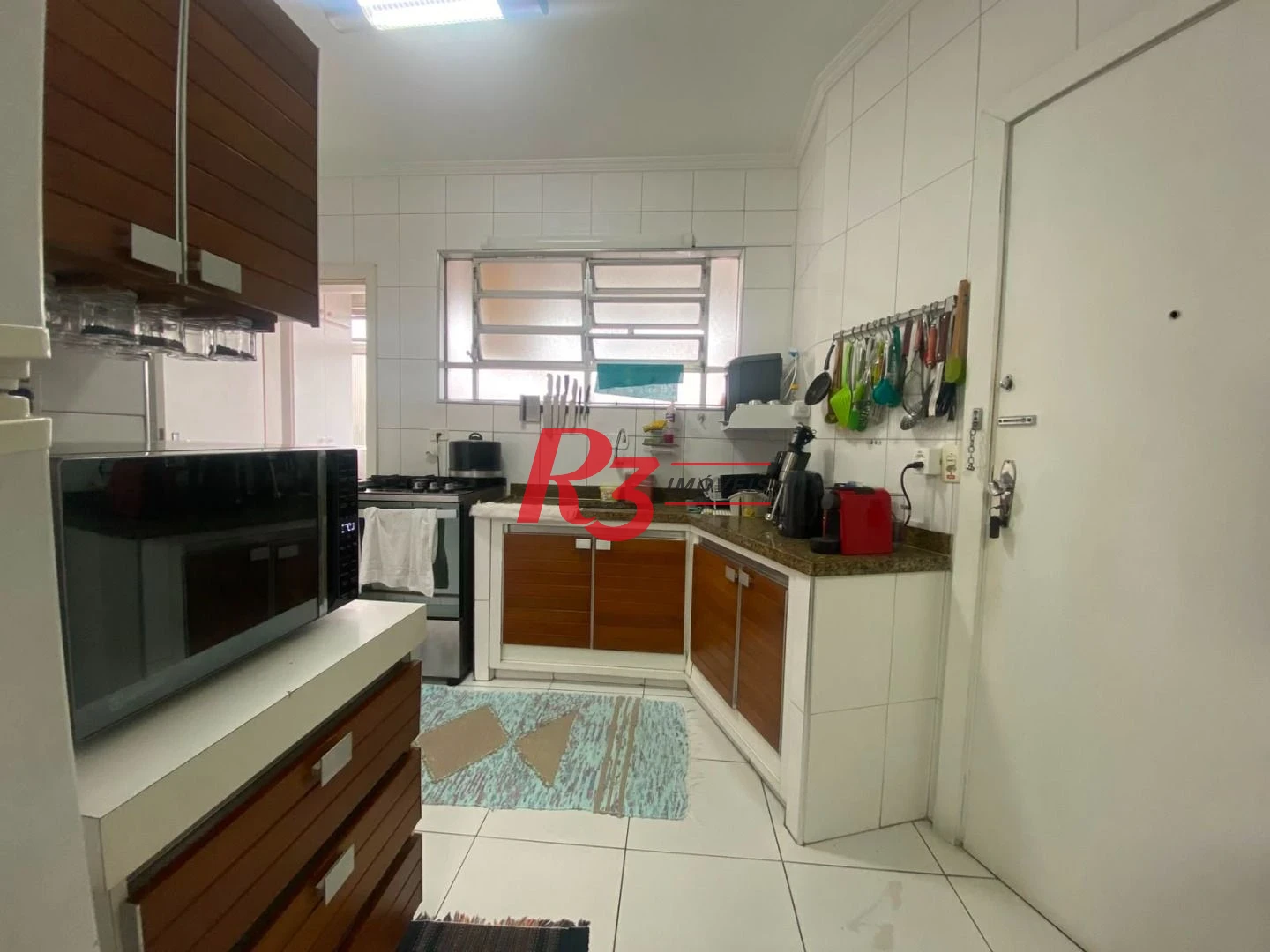 Apartamento com 3 dormitórios à venda, 130 m² por R$ 1.250.000,00 - Gonzaga - Santos/SP
