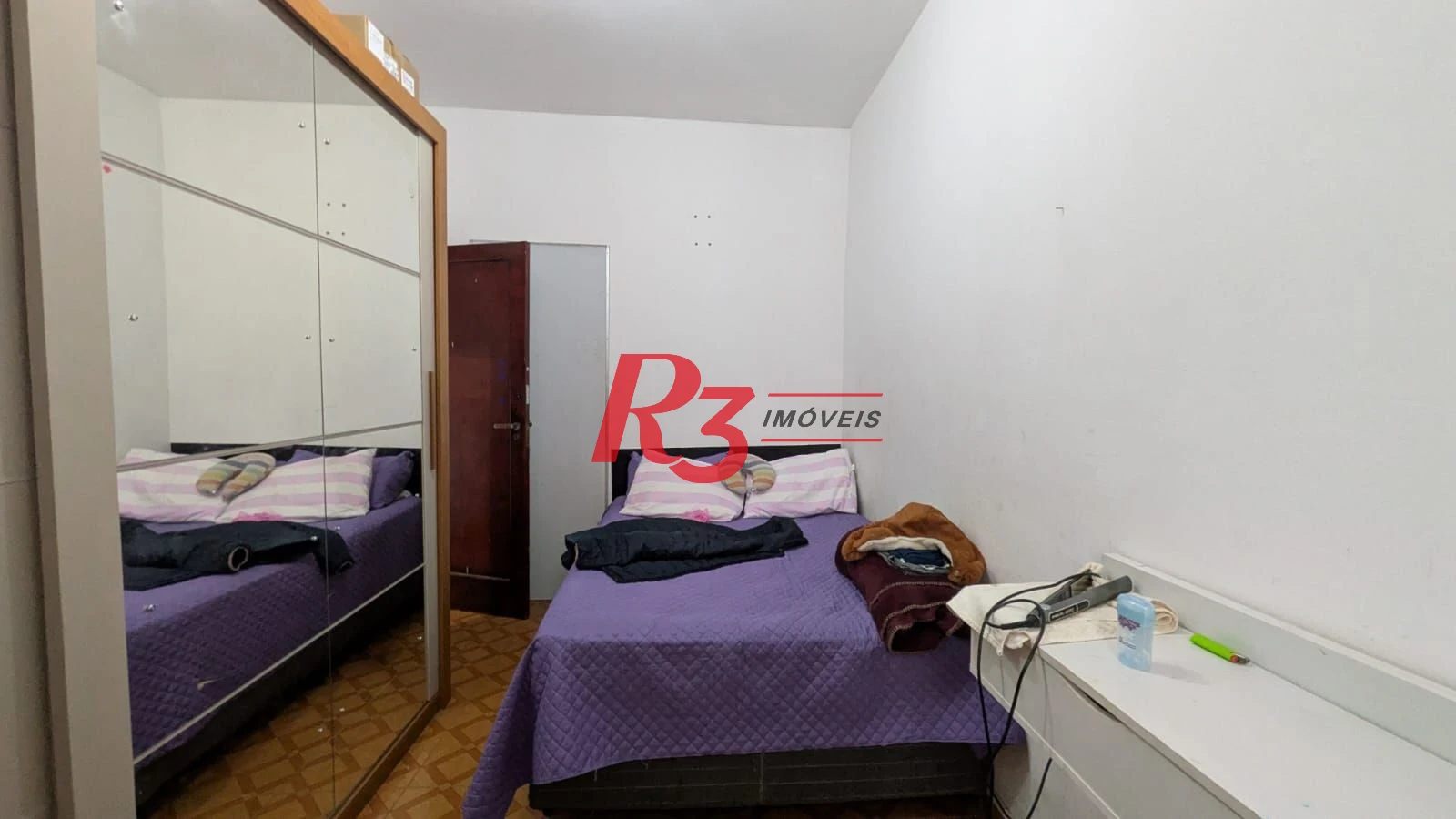 Sobrado com 2 dormitórios à venda, 69 m² por R$ 320.000,00 - Macuco - Santos/SP